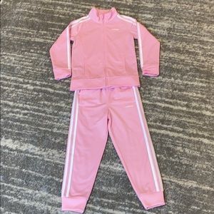 Pink track suit